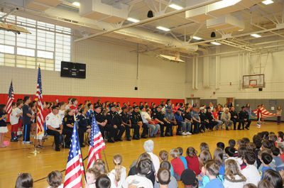 Flag Day Ceremony 
Rochester Memorial School 4th Grade held an all school Flag Day ceremony on June 14th honoring and thanking community first responders.  Commencing this energy filled event was the raising of the flag to the National Anthem followed by the Pledge of Allegiance.  Acknowledgements to a fantastic show of local and state police, fire fighters, EMT’s, veterans and serving military heroes was presented through 4th grade students and famous poems, songs and personal thank yous. Photos courtesy of Ilana Mackin
