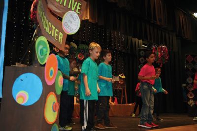 RMS C.A.R.E.S.
The fourth-graders at Rochester Memorial School put on a presentation on Thursday, January 26, called RMS C.A.R.E.S. Each fourth grade class represented a word comprising the C.A.R.E.S. acronym: Cooperation, Assertiveness, Responsibility, Empathy, and Self-Control. The positive message was well received by the crowd, and the young students in the front rows definitely showed their enjoyment throughout the show. Photos by Jean Perry
