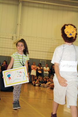 Vocabulary Day Parade
A living, breathing, (and giggling) dictionary of vocabulary words displayed their intellect and imagination at Rochester Memorial School during its first annual Vocabulary Day Parade on April 4. Photo by Jean Perry
