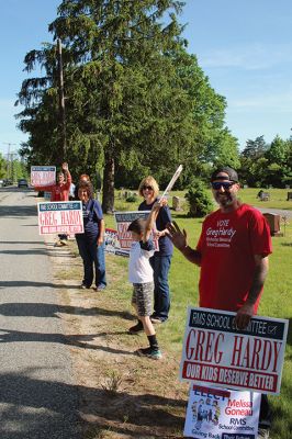 Election Day 
May 25 was Election Day in the Town of Rochester, and candidates and their ardent supporters lined Dexter Lane to greet and thank voters driving to and from the Senior Center. Photos by Mick Colageo
