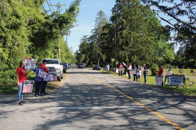 Election Day 
May 25 was Election Day in the Town of Rochester, and candidates and their ardent supporters lined Dexter Lane to greet and thank voters driving to and from the Senior Center. Photos by Mick Colageo
