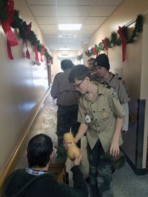 Rochester Scout
Rochester Lions Club members joined forces again on December 15 with Scout Troop 31 and other community volunteers at the Council on Aging to help make the COA’s Christmas Holiday Dinner program successful. Scouts packed 68 Christmas dinner bags of turkey, fresh vegetables, and all the fixings for delivery. The Rochester Lions Club works hard all year to raise the funds to provide these holiday meals at Thanksgiving and Christmas to area seniors and families in need.  
