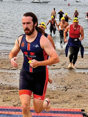 Lions Club Triathlon
2024 Old Rochester High School graduate Tyler Young of Marion and Heather Peckham of Middletown, Rhode Island, finished first in the respective men’s and women’s categories of Sunday morning’s Lions Club Triathlon at the Mattapoisett Town Beach. Young, 18, will join the UMass Lowell cross-country and track programs next month. Photos by Mick Colageo and Robert Pina
