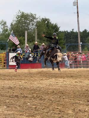 Rochester Rodeo
The second of the bi-weekly rodeo was held at the Rochester Fair Grounds this past Saturday by New England Rodeo. Present were over 20 professional bull riders from New England, Latin America, and Brazil. There were also professional barrel riders and mounted shooters. There were some young cowboys and cowgirls who also gave it their best to stay on a bucking pony. Children under 14 years of age were invited to the field to participate in competitive games to win a ribbon. Photos by Michael J. DeCicco & Hea
