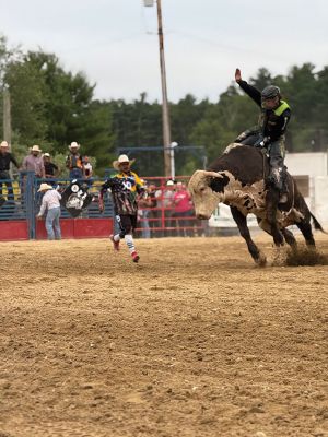 Rochester Rodeo
The second of the bi-weekly rodeo was held at the Rochester Fair Grounds this past Saturday by New England Rodeo. Present were over 20 professional bull riders from New England, Latin America, and Brazil. There were also professional barrel riders and mounted shooters. There were some young cowboys and cowgirls who also gave it their best to stay on a bucking pony. Children under 14 years of age were invited to the field to participate in competitive games to win a ribbon. Photos by Michael J. DeCicco & Hea
