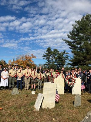 Sons of The American Revolution
Under a glorious blue and white sky, people came together at Rochester’s Center Ceremony on October 26 to memorialize a revolutionary patriot, Thomas Bassett. The ceremony was led by the Cape and Islands Chapter of the Sons of The American Revolution. Connie Eshbach, Chairman of the Rochester Historical Commission, was the keynote speaker and spoke of Bassett’s service during the war. “Thomas Bassett served as a private under Captain Stephen Wing on Dorchester Heights in March 1776. He also served as a seam
