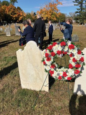 Sons of The American Revolution
Under a glorious blue and white sky, people came together at Rochester’s Center Ceremony on October 26 to memorialize a revolutionary patriot, Thomas Bassett. The ceremony was led by the Cape and Islands Chapter of the Sons of The American Revolution. Connie Eshbach, Chairman of the Rochester Historical Commission, was the keynote speaker and spoke of Bassett’s service during the war. “Thomas Bassett served as a private under Captain Stephen Wing on Dorchester Heights in March 1776. He also served as a seam
