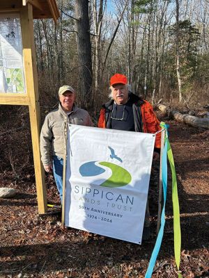 Sippican Lands Trust 
Sippican Lands Trust was pleased to officially open the Hoff Property parking lot and connecting trail to White Eagle on Route 6, with the help of Selectman Randy Parker. Mr. Parker cut the ceremonial ribbon, as he was instrumental in securing the land required for the project, by working with MOSAC, BBC, and SLT. Hikers and SLT Board members enjoyed hot coffee and snacks after a morning hike, while hearing speeches from Mr. Parker, President Cathy Stone, Past President Alan Harris, and MOSAC Chair John Roc
