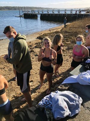 Sammy Swims
Boston Pride hockey player Samantha Davis was back in Marion for Christmas Eve, the final day of her 24-day “Sammy Swims” fundraiser for the Travis Roy Foundation. The 2015 Tabor Academy graduate and her friend, Jenna Seibold, an Endicott College student from Reading, swam off the beach from various south shore locations beginning on December 1. The effort drew dozens of participants and raised $15,372 in memory of Tabor legend Travis Roy, who passed away in late October. Photo courtesy Travis Roy Foundatio
