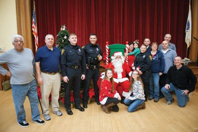 Pizza with Santa
The Marion Police Brotherhood held its 5th annual Pizza with Santa on Sunday, December 4, at the Marion Music Hall. Kids shared a pie with jolly old Saint Nick and later posed for pictures. Photos by Colin Veitch
