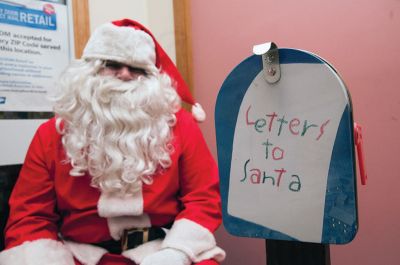 Santa at the Rochester Post Office
Santa made a stop at the Rochester Post Office on December 20 to collect some letters from Tri-Town children and to take some time to visit with the kids and have a little juice and cookies. Photos by Felix Perez
