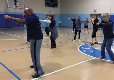 Self Defense
Major Dwayne Fortes and Lt. Jennifer Keegan of the Plymouth County Sheriff’s Department instructed a group of women from all age groups on how to defend themselves during a physical assault. The program that Fortes spearheaded and developed combines marshal arts with traditional evasive moves. The May 10 event was hosted by the Mattapoisett Recreation Department. Photos by Marilou Newell
