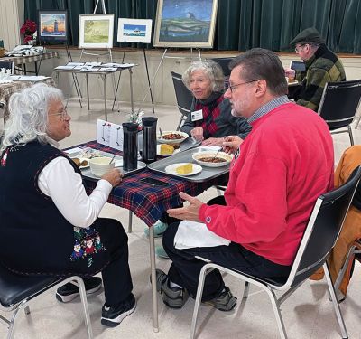St. Anthony Christmas Fair 
Council Chair Phil Jackson and Mary Jackson enjoy a light lunch and watch bids coming in on silent auction items donated by artists C. Stockbridge, R. Van Inwegen, G. Grosart and more!
Christmas music skillfully  provided by Elliot Talley. While nearby Tara Rajaniemi sells cross body bags she created. Photo by Jennifer F. Shepley

