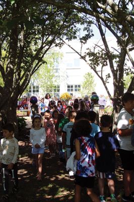 Children’s Memorial Garden
Where for many years stood a tall spruce tree at Sippican Elementary School is now a large stump at the center of a newly dedicated Children’s Memorial Garden honoring the lives of former students Marques Sylvia, Andrew Rego, Alexis Wisner and Cory Jackson. On June 14, Principal Marla Sirois led a celebration of the vision of former Principal Marylou Hobson (1990-2004) and the generosity and effort of Steve Gonsalves, Suzanna Davis, Margie Baldwin and the Pythagorean Lodge. Photos by Mick Colageo
