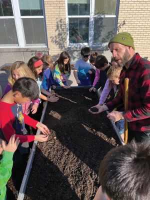 Sippican Elementary School
Sippican Elementary School third graders and Nate Sander of the Marion Institute plant garlic and clover during the Grow FTS program. The students learned about how the sun and soil work together to produce an environment conducive for a plant to grow and thrive. Photos courtesy ORR District 
