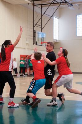 Sippican School Basketball
The Sippican School gymnasium was lit up the night of Thursday, March 23, for the annual sixth grade versus staff and parents basketball game. The adult team seemed to have fun giving the students a consistently hard time throughout, but in the end, it was the students who triumphed 37-33. Photos by Colin Veitch
