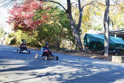 Soap Box Derby
Marion Scout Pack 32 (back) and the Rochester Cub Scouts (front) at the annual soap box derby Held on Holmes Street on November 9. Photos by Sam Bishop
