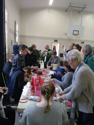 Socks of Love 
Mattapoisett Congregational Church thanks the community for its generosity and help in preparing Socks of Love for the homeless on Sunday, February 9. The church and community joined forces to deliver 60 pairs of socks to adults and 24 pairs to children in New Bedford. Each package included toiletries and a handwritten Valentine card. Photo courtesy Tina Zantrofski
