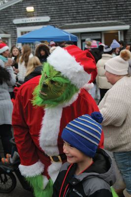 Marion’s Christmas Stroll 
The Town of Marion’s annual Christmas Stroll held on December 11 featured rides with Santa and Mrs. Claus on horse-drawn carriages, live entertainment from the Sippican Elementary School musicians, Christmas songs performed by Tabor Academy students, children’s activities and many refreshments offered along the sidewalks by village merchants. Photos by Mick Colageo
