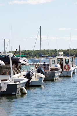 Summer Days
 Buzzards Bay was active this past Labor Day weekend with boaters and residents out enjoying the late summer weather on this unofficial last weekend of the summertime season. The colors of summer will soon shift to the colors of fall in the harbor, but not before a few more opportunities to take out those kayaks and sailboats with friends and family. Photos by Colin Veitch
