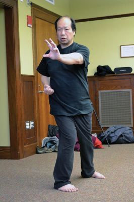 World Tai Chi and Qigong Day
A group in Mattapoisett joined others across the globe in celebrating World Tai Chi and Qigong Day on April 26 at 10:00 am, just as other groups did at 10:00 am in their local time zones. Led by Tai Chi Practitioner Colman Fink, 15 locals moved gracefully together with conscious breath in the downstairs of the Mattapoisett Free Library – thanks to the rain that dampened the plan to meet at Ned’s Point for a second year in a row. By Jean Perry
