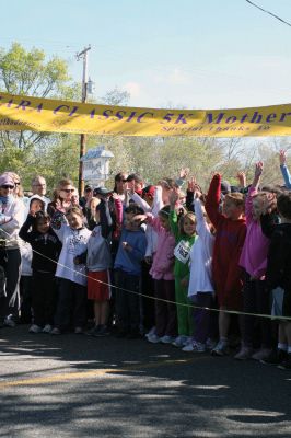 Mom's Running
Over 600 runners came to Mattapoisett on May 9, 2010 to celebrate mom in the fourth annual Tiara Classic 5K road race. This years race had more runners than ever, despite the wind and cold temperatures. The road race benefits the New Bedford Womens Fund, an organization that empowers and provides upward mobility to women. Photos by Anne OBrien-Kakley.
