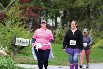 Mother’s Day Tiara 5k
Sunday’s wind and rain wasn’t stopping the hundreds who participated in the annual Mother’s Day Tiara 5k in Mattapoisett on May 10.  The storm brought strong wind and cold rain to the area, especially at the turn around Ned’s Point Lighthouse, dampening the day but not the sentiment behind the Women’s Fund of Southeastern Massachusetts’ largest annual fundraising event. Photos by Jean Perry
