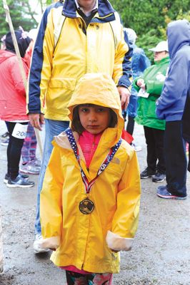 Tiara 5K Road Race
The Tiara 5K road race sponsored by Oxford Creamery has become a staple Mother’s Day tradition in Mattapoisett. The weather was damp and chilly, but still 441 runners turned out for the Mattapoisett village run to benefit the Women’s Fund of New Bedford. Photos by Colin Veitch
