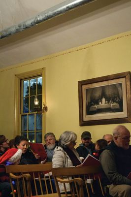 Tinkhamtown Chapel Christmas Choir Sing-Along
The 70th annual Tinkhamtown Chapel Christmas Choir Sing-Along. Smiles and merriment abound in this small but cozy and inviting environment. Not a free pew was seen and all smiled. The chapel was built in 1889 and has been maintained by locals who care deeply for its continued standing and operation. Though I had never been, I felt embraced, comfortable, and at home. Photos by Sam Bishop.
