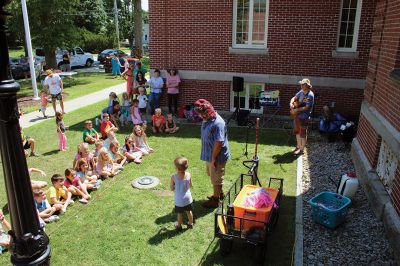 Toe Jam Puppet Band
Vinny Lovegrove makes the kiddos laugh during a performance by the Toe Jam Puppet Band on August 10 outside the Mattapoisett Free Public Library. Photos by Mick Colageo
