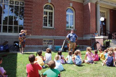 Toe Jam Puppet Band
Vinny Lovegrove makes the kiddos laugh during a performance by the Toe Jam Puppet Band on August 10 outside the Mattapoisett Free Public Library. Photos by Mick Colageo
