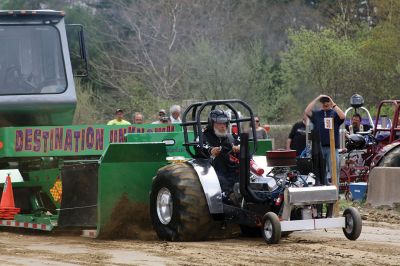 Rochester Tractor Pull
If you were anywhere near the Rochester Country Fair grounds on Saturday, you heard the familiar sounds of revving tractor engines echoing throughout the town. The country fair committee held a tractor pull/swap fundraiser on April 29. Those who attended got an early taste of the sights, sounds, and smells of the Rochester Country Fair with dirt flying, engines blasting, and diesel smoke billowing up into the air. Photos by Jean Perry
