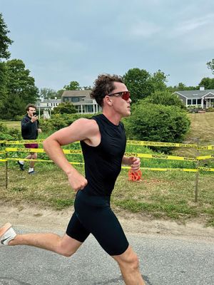 Mattapoisett Triathlon
The Mattapoisett Triathlon took place on Sunday, July 27. The event, hosted by the Mattapoisett Lions Club, saw over 100 competitors begin from Town Beach, swim 0.25 miles, bike 10 miles north of town and back, and finally run a 5K past Ned’s Point and back around to the beach. Photo by Robert Pina
