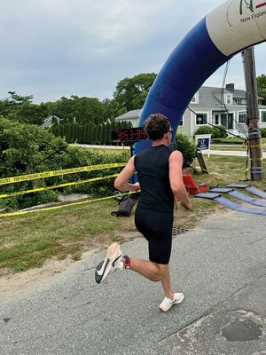 Mattapoisett Triathlon
The Mattapoisett Triathlon took place on Sunday, July 27. The event, hosted by the Mattapoisett Lions Club, saw over 100 competitors begin from Town Beach, swim 0.25 miles, bike 10 miles north of town and back, and finally run a 5K past Ned’s Point and back around to the beach. Photo by Robert Pina
