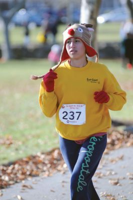 Marion Turkey Trot
It was a cold start, race, and finish for the Marion Recreation Annual Turkey trot this Sunday but spirits were high. Matt Sylvain of Dartmouth took top honors for the men with a time of 18:33 and Allison Rossi for the Women with a time of 21:02. Photos by Felix Perez
