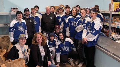 Upper Cape Tech hockey team
On December 18, the Upper Cape Tech hockey team, along with coaches Tim Arruda and Joe McGuire, volunteered to help those in need at Damien’s Food Pantry in Wareham. The boys bagged and delivered groceries to members of the community for the holiday season. It is not a win on the ice, but it is a win for the community. Photos courtesy of UCT
