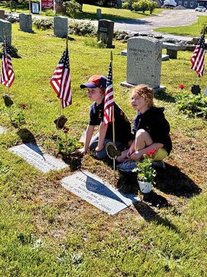 Memorial Day
Girl Scouts, Brownies, and Cub Scouts assisted with planting flowers at veterans’ gravesites for Memorial Day. Photo by Robert Pina
