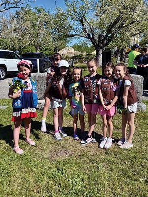 Memorial Day
Girl Scouts, Brownies, and Cub Scouts assisted with planting flowers at veterans’ gravesites for Memorial Day. Photo by Robert Pina

