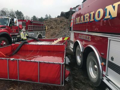 Tri-Town firefighters
The holidays were challenging for Tri-Town firefighters. Marion and Rochester fire departments were among towns assisting Wareham after a mulch pile in a remote location off County Road caught fire on Christmas Eve. Firefighters worked in cold temperatures for eight hours, dispensing approximately 200,000 gallons of water to extinguish the fire. Seen supporting Wareham Fire Chief John Kelley and 29 Wareham Fire personnel at the scene were Marion Fire Tanker 1, Lieutenant Michael Still and Captain Joel Watte
