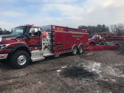 Tri-Town firefighters
The holidays were challenging for Tri-Town firefighters. Marion and Rochester fire departments were among towns assisting Wareham after a mulch pile in a remote location off County Road caught fire on Christmas Eve. Firefighters worked in cold temperatures for eight hours, dispensing approximately 200,000 gallons of water to extinguish the fire. Seen supporting Wareham Fire Chief John Kelley and 29 Wareham Fire personnel at the scene were Marion Fire Tanker 1, Lieutenant Michael Still and Captain Joel Watte
