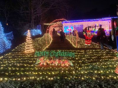 Christmas Lights
Marino Carrerio of Mattapoisett held the lighting of his home’s Christmas décor Saturday, November 30. Pictured is a lit walkway leading to the side of the property and to more lights and decorations. Photo by Shawn Sweet. December 5, 2024 edition
