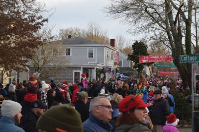 2024 Marion Christmas Stroll 
The 2024 Marion Christmas Stroll took place on December 8. Pictured are Carolers outside The Sippican Historical Society (top), Mr. and Mrs. Clause riding their carriage on Front Street (left), and Santa arriving by tugboat (bottom). Photos by Sam Bishop and Mick Colageo.
