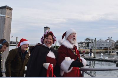 2024 Marion Christmas Stroll 
The 2024 Marion Christmas Stroll took place on December 8. Pictured are Carolers outside The Sippican Historical Society (top), Mr. and Mrs. Clause riding their carriage on Front Street (left), and Santa arriving by tugboat (bottom). Photos by Sam Bishop and Mick Colageo.
