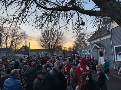 2024 Marion Christmas Stroll 
The 2024 Marion Christmas Stroll took place on December 8. Pictured are Carolers outside The Sippican Historical Society (top), Mr. and Mrs. Clause riding their carriage on Front Street (left), and Santa arriving by tugboat (bottom). Photos by Sam Bishop and Mick Colageo.
