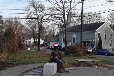 2024 Marion Christmas Stroll 
The 2024 Marion Christmas Stroll took place on December 8. Pictured are Carolers outside The Sippican Historical Society (top), Mr. and Mrs. Clause riding their carriage on Front Street (left), and Santa arriving by tugboat (bottom). Photos by Sam Bishop and Mick Colageo.
