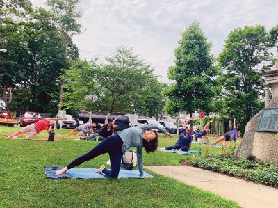 Yoga on the Lawn
The Mattapoisett Library is offering free "Yoga on the Lawn" sessions every Thursday at 10:30 am during July. The sessions are guided by Andrea DeVeau-Cabral. Photo courtesy of Amanda Lawrence
