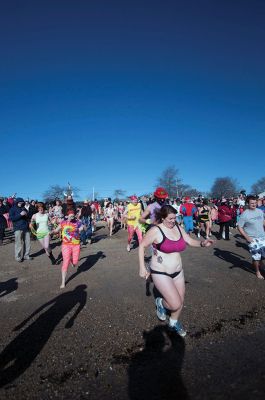 2015 Freezin’ for a Reason Polar Plunge
The 2015 Freezin’ for a Reason Polar Plunge on New Year’s Day at Town Beach in Mattapoisett was a splashing success, according to event coordinator Michelle Huggins. The third annual polar plunge raised nearly $10,000 to provide financial assistance to local families battling cancer. Many participants donned costumes, competing for the best costume trophy.  Photo by Felix Perez
