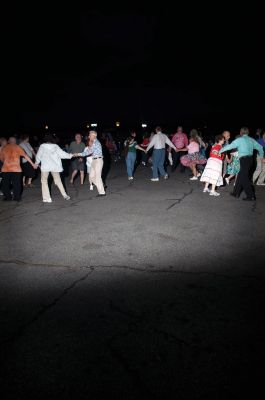 Square Dancing
It was good, ol fashioned, square-dancin fun at the Mattapoisett gazebo on July 10, 2010. As the sun set over Mattapoisett harbor, the Wareham Swingers dance group held a free, all-ages square dancing session. Photo by Felix Perez.
