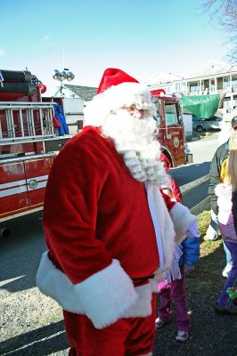 Holiday in the Park 2007
Here Santa arrives for Mattapoisett's annual "Holiday in the Park" celebration which was held in Shipyard Park on Saturday, December 1, 2007 and drew a record crowd to the seasonal seaside event. (Photo by Robert Chiarito).
