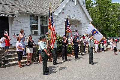 Memorial Day 2007
Mattapoisett/Rochester Veterans Agent Barry Denham stands at attention and salutes during the playing of the National Anthem during the annual Memorial Day Exercises held in Rochester on Sunday, May 27 in the town center. (Photo by Robert Chiarito).
